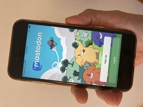 The Mastodon site is shown on a smart phone in Oakland, Calif., on Friday, Nov. 11, 2022. Sites like Mastodon and even Tumblr are emerging as new (or renewed) alternatives to Twitter.