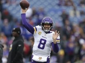 Minnesota Vikings quarterback Kirk Cousins passes the ball prior to an NFL football game against the Buffalo Bills, Sunday, Nov. 13, 2022, in Orchard Park, N.Y.