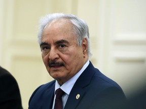 FILE - Libyan Gen. Khalifa Hifter joins a meeting with the Greek Foreign Minister Nikos Dendias in Athens, Greece, Jan. 17, 2020. The Libyan military commander who once lived in Virginia sat for a deposition Sunday, Nov. 6, 2022, in a U.S. lawsuit in which he is accused of orchestrating indiscriminate attacks on civilians and torturing and killing political opponents, according to an advocacy group that supports the lawsuit.