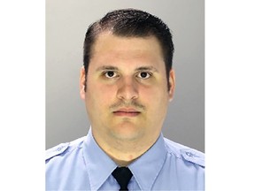 FILE - This undated photo provided by Philadelphia Police Department shows former Philadelphia Police Officer Eric Ruch Jr., charged with first-degree murder, Oct. 9, 2020, in the 2017 shooting of a Black man after a high-speed car chase. A judge on Thursday, Nov. 17, 2022, sentenced Ruch Jr. to 11½ to 23 months in prison in the 2017 fatal shooting of Dennis Plowden Jr., an unarmed Black motorist, far less than the decades behind bars he potentially faced. (Philadelphia Police Department via AP, File)