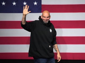 Pennsylvania Lt. Gov. John Fetterman, Democratic candidate for U.S. Senate from Pennsylvania, takes the stage at an election night party in Pittsburgh, early Wednesday, Nov. 9, 2022.