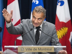 Fady Dagher responds to questions after being introduced as the new chief of the Montreal Police service in Montreal, on Thursday, Nov. 24, 2022. Dagher, whose nomination was announced Thursday, is currently chief of police in the Montreal suburb of Longueuil, Que., where he has gained a reputation for building links between the police and the community in that city.