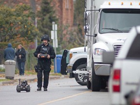 WINDSOR, ONTARIO:. NOVEMBER 17, 2021 - Windsor police use a robot to assist in the search of a residence on the 1700 block of Drouillard Road, on Wednesday, Nov. 17, 2021. After a heated debate, the San Francisco Board of Supervisors voted to pass a policy that would allow officers to use ground-based robots to kill "when risk of loss of life to members of the public or officers is imminent and officers cannot subdue the threat after using alternative force options or de-escalation tactics."