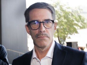 Former Parti Québécois leader André Boisclair arrives at the courthouse in Montreal, Monday, June 20, 2022. Boisclair has been denied his first chance at parole in a decision rendered this week.