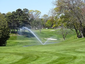 Sprinklers water the fairways at Lakeview Golf Course in Mississauga, Ont., on Wednesday, May 12, 2021. Golf's origins date back hundreds of years to rural Scotland where the natural features of the land near Edinburgh created the hazards that golfers had to play around and sheep kept the grass well manicured.