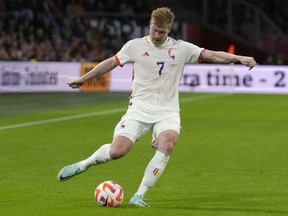 Belgium's Kevin De Bruyne kicks the ball during the UEFA Nations League soccer match between the Netherlands and Belgium at the Johan Cruyff Arena in Amsterdam, Netherlands, Sunday, Sept. 25, 2022.