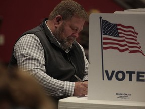 South Dakota Rep. Jamie Smith, who is running for governor as a Democrat, votes Tuesday in Sioux Falls. S.D.