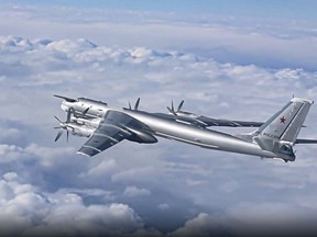 A Tu-95 strategic bomber of the Russian air force flies as part of a joint patrol with Chinese bombers over the Pacific.
