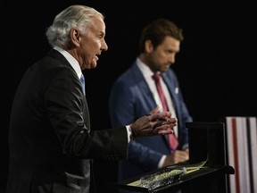 Gov. Henry McMaster and former U.S. Rep. Joe Cunningham participate in a gubernatorial debate in Columbia, S.C., on Wednesday, Oct. 26, 2022.