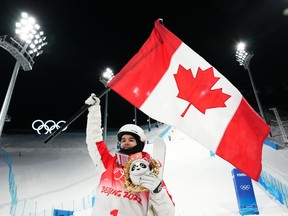 Mikael Kingsbury, of Canada, celebrates his silver medal winning run at men's moguls finals at the 2022 Winter Olympics in Zhangjiakou, China on Saturday, February 5, 2022. The world's most accomplished moguls skier is about to depart for a training block in Finland where the World Cup season opens Dec. 4-5 in Ruka.