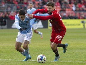 Toronto FC has traded fullback/midfielder Luca Petrasso to Orlando City SC in a deal that could net TFC up to US$400,000 in allocation money. Petrasso (right) challenges for the ball with New York City FC's Gabriel Pereira during second half MLS action in Toronto on April 2, 2022.