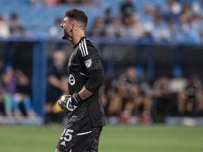 Toronto FC goalkeeper Alex Bono (25) reacts after winning an MLS soccer match against Charlotte FC on Aug. 27, 2022, in Charlotte, N.C. Expansion St. Louis City FC gets to grow its roster Friday via the MLS expansion draft. Toronto FC's unprotected list essentially covers players already with one foot out the door in goalkeepers Alex Bono and Quentin Westberg, who like Canadian international defender Doneil Henry are out of contract.