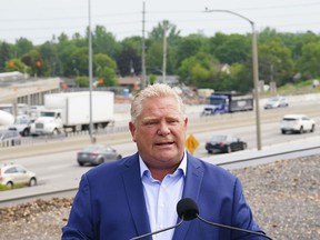 Conservative leader Doug Ford makes a campaign stop in Ottawa on Monday, May 30, 2022.&ampnbsp;Ontario's auditor general says the province ignored its own experts when it decided to prioritize building eight highways, including Highway 413 and the Bradford Bypass.