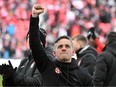 Canada coach John Herdman reacts to fans after a win over Jamaica at BMO Field clinched qualification to the 2022 FIFA World Cup.