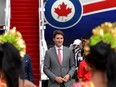 Canadian Prime Minister Justin Trudeau arrives at Ngurah Rai International Airport ahead of the G20 Summit in Bali, Indonesia November 14, 2022. At a press conference Sunday in Cambodia, Trudeau wouldn’t commit to bringing up the issue of foreign interference at a potential meeting. He didn’t directly answer when asked twice whether he would raise the issue with Xi at the G20.