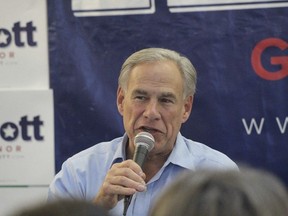 Texas Governor Greg Abbott speaks at a rally Friday, Nov. 4, 2022 at Michael's Charcoal Grill in Midland, Texas.