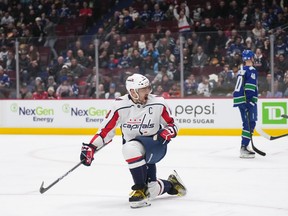 Washington Capitals' Alex Ovechkin, of Russia, celebrates his first goal against the Vancouver Canucks during the first period of an NHL hockey game in Vancouver, on Tuesday, November 29, 2022.
