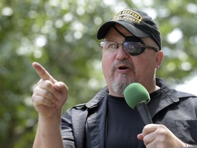 FILE - Stewart Rhodes, founder of the citizen militia group known as the Oath Keepers speaks during a rally outside the White House in Washington, on June 25, 2017. A witness testified Wednesday that Oath Keepers founder Stewart Rhodes tried to get a message to then-President Donald Trump days after the Jan. 6, 2021 insurrection through an intermediary. He wanted to urge Republican to fight to stay in power and "save the republic."