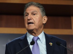FILE - Sen. Joe Manchin, D-W.Va., speaks during a news conference Tuesday, Sept. 20, 2022, at the Capitol in Washington. President Joe Biden on Saturday was criticized by Manchin for being "cavalier" and "divorced from reality" the day after vowing to shuttered coal fired electric plants and lean heavier on wind and solar energy in the future.