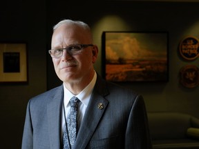 FILE - U.S. Customs and Border Protection Commissioner Chris Magnus poses for a photograph during an interview in his office with The Associated Press, Feb. 8, 2022, in Washington.