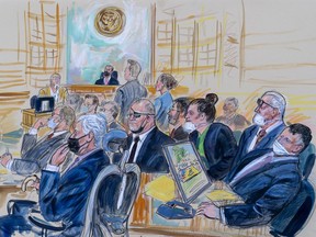 FILE - This artist sketch depicts the trial of Oath Keepers leader Stewart Rhodes and four others charged with seditious conspiracy in the Jan. 6, 2021, Capitol attack, in Washington, Oct. 6, 2022. Shown above are, witness John Zimmerman, who was part of the Oath Keepers' North Carolina Chapter, seated in the witness stand, defendant Thomas Caldwell, of Berryville, Va., seated front row left, Oath Keepers leader Stewart Rhodes, seated second left with an eye patch, defendant Jessica Watkins, of Woodstock, Ohio, seated third from right, Kelly Meggs, of Dunnellon, Fla., seated second from right, and defendant Kenneth Harrelson, of Titusville, Fla., seated at right. Assistant U.S. Attorney Kathryn Rakoczy is shown in blue standing at right before U.S. District Judge Amit Mehta. Watkins told jurors Wednesday, Nov. 16 that it was a "really stupid" decision, saying she got swept up in what seemed to be a "very American moment."
