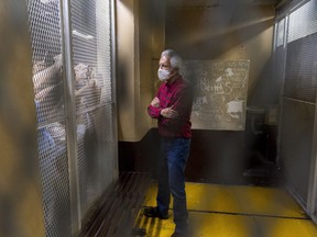 FILE - Award-winning journalist Jose Ruben Zamora, who was arrested the day before, stands inside a cell after a court hearing, in Guatemala City, Saturday, July 30, 2022. The prominent Guatemalan investigative newspaper "El Periodico" announced on Nov. 30, 2022 that it is stopping its print edition, after the government arrested Zamora, the paper's president.