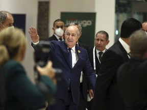 Algerian President Abdelmadjid Tebboune, center, arrives to attend the Arab Summit in Algiers, Algeria, Tuesday, Nov. 1, 2022. Arab leaders are meeting in Algeria at the 31st summit of the largest annual Arab conference to seek common ground on divisive issues in the region. The meeting comes against the backdrop of rising inflation, food and energy shortages, drought and soaring cost of living across the Middle East and Africa.