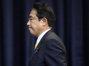 Japan's Prime Minister Fumio Kishida arrives for a press conference in Bangkok, Thailand, on the sidelines of the Asia-Pacific Economic Cooperation, APEC summit, Saturday, Nov. 19, 2022.