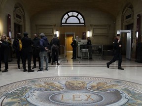 Entrance of the courtroom where a former Liberian rebel is on trial in Paris courthouse, Monday, Oct. 10, 2022. Kunti Kamara is notably accused of "complicity in massive and systematic torture and inhumane acts" against the civilian population committed in Liberia's Lofa county in 1993-1994.