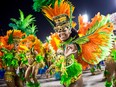 Members of Vila Isabel samba school perform during its parade at Rio Carnival.