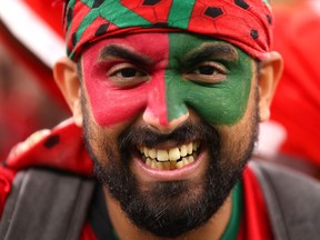 A Morocco fan shows his support for his team before the Morocco-Canada match at FIFA World Cup Qatar 2022 at Al Thumama Stadium  in Doha, Qatar.  Clive Brunskill / Getty Images