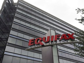 The Equifax Inc., offices in Atlanta are shown on July 21, 2012. Equifax Canada says an increase in borrowers helped push total consumer debt to $2.36 trillion in the third quarter for a 7.3 per cent rise from last year even as mortgage volumes decline.