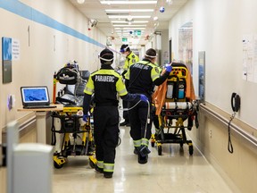 Toronto Paramedics deliver patients to the emergency room at Humber River Hospital.