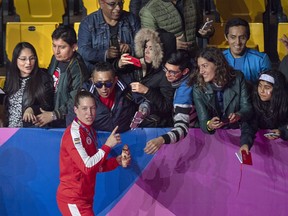 Canada's Myriam Da Silva from Chambly, Que. is greeted by the crowd as she leaves after her fight in the 69-kilogram boxing event at the Pan Am Games in Lima, Peru on Thursday, Aug. 1, 2019. Da Silva Rondeau and former Vancouver Whitecaps player Ciara McCormack are among the women testifying before members of Parliament today as the Standing Committee Status of Women continues its hearings on the safety of women and girls in sport.&ampnbsp;&ampnbsp;THE CANADIAN PRESS/Andrew Vaughan