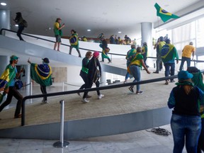 Supporters of Brazil's former President Jair Bolsonaro demonstrate against President Luiz Inacio Lula da Silva, in Planalto Palace, in Brasilia, Brazil, January 8, 2023.