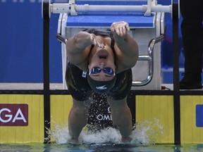 Kylie Masse, of Canada, starts in her semifinal of the women's 50m backstroke during the world swimming short course championships in Melbourne, Australia, Thursday, Dec. 15, 2022.&ampnbsp;Mac Neil and Masse, who took gold and silver in the event at last year's championships in Abu Dhabi, were second and fourth after semifinals.
