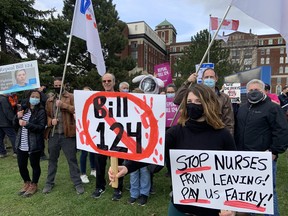 Health-care workers rally against Ontario's Bill 124 in front of the Ottawa Civic Hospital, April 26, 2022.