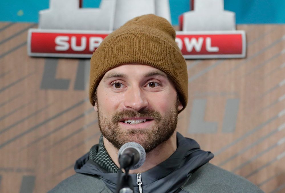 HOUSTON, TX - JANUARY 30:  Chris Long #95 of the New England Patriots speaks with the media during Super Bowl 51 Opening Night at Minute Maid Park on January 30, 2017 in Houston, Texas.  (Photo by Tim Warner/Getty Images)