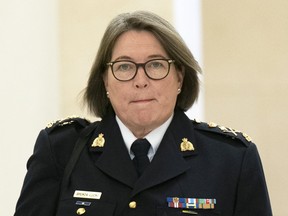 RCMP Commissioner Brenda Lucki heads to a meeting of the House of Commons public safety committee on Monday, October 31, 2022.