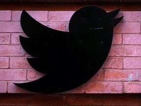 The Twitter logo is seen outside the offices in New York City, U.S., November 9, 2022. REUTERS/Brendan McDermid/File Photo