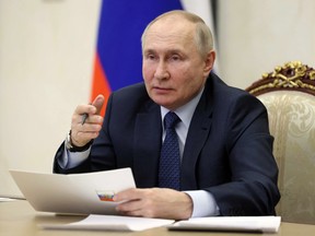 Russian President Vladimir Putin holds the annual meeting of the Presidential Council for Civil Society and Human Rights, via video conference, in Moscow on December 7, 2022.