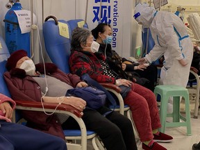 COVID-19 patients rest in the Second Affiliated Hospital of Chongqing Medical University in China's southwestern city of Chongqing on Dec. 23.
