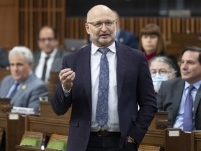 Minister of Justice and Attorney General of Canada David Lametti rises during Question Period, in Ottawa, Friday, Nov. 25, 2022.