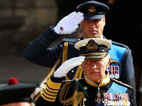 Britain's King Charles and Britain's William, Prince of Wales attend the state funeral and burial of Britain's Queen Elizabeth, in London, Britain, September 19, 2022. (REUTERS/Hannah McKay)