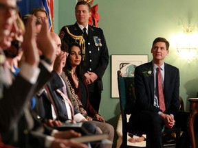 Premier David Eby looks on as ministers are sworn in during a ceremony at Government House in Victoria, B.C., Wednesday, Dec. 7, 2022. Eby says his New Democratic government plans to keep spending in 2023 to support British Columbia families even as darker economic headwinds approach.