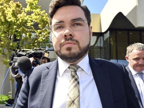 Former Liberal Party staffer Bruce Lehrmann leaves the ACT Supreme Court in Canberra, on Oct. 27, 2022. An Australian prosecutor says he dropped a rape charge against Lehrmann, a former government adviser, Friday, Dec. 2, 2022, because of the life-threatening trauma a trial would cause the woman allegedly assaulted in a Parliament House office.