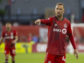Domenico Criscito of Toronto FC gestures to teammates during second half MLS action against San Jose Earthquakes in Toronto on Saturday July 9, 2022. Veteran defender Criscito, who announced his retirement from Toronto FC in mid-November, has resurfaced with his former club Genoa in Italy.