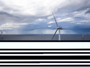 Hywind Scotland, the world's first commercial wind farm using floating wind turbines, is visible off the coast of Scotland in August 2017. Tuesday, Dec. 6, 2022, marks the first-ever U.S. auction for leases to develop commercial-scale floating wind farms in the deep waters off the West Coast. (Woldcam/Equinor via AP)