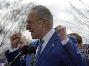 Senate Majority Leader Chuck Schumer of N.Y., speaks during a news conference with members of Congress, and airport service workers, about the 'Demand Good Jobs for Good Airports Act,' Thursday, Dec. 8, 2022, on Capitol Hill in Washington.