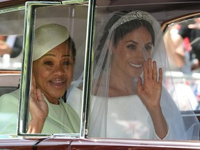 Meghan Markle and her mother, Doria Ragland, arrive for her wedding ceremony to marry Britain’s Prince Harry, Duke of Sussex, at St George’s Chapel, Windsor Castle, in Windsor, on May 19, 2018.